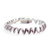 silver-toned bracelet featuring spiral links set with pink gemstones