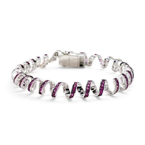 silver-toned bracelet featuring spiral links set with pink gemstones