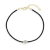 Black cord bracelet with a sparkling round zircon pendant and a gold clasp